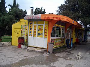 Almost to the finish line, this Popaj's (pronounced just like  "Popeye's") Fast Food stand is always a killer to run past because the food smells so good.