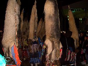 Crazy carnival costumes - about a dozen guys wearing these crazy hats.