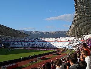 The Torcida fans holding up posters to create a cool display in the stands.