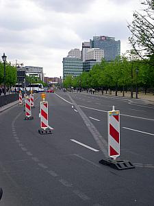 The bricks in-laid in the road indicate where the Berlin Wall used to run.