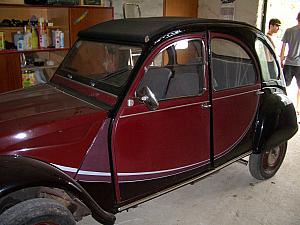 An old Citroen car, in a garage where we picked up our raft.