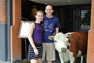 Buenos Aires - posing in front of a stuffed cow at the entrance to an expensive parilla (steakhouse). We didn't eat here, but we did visit a fantastic steakhouse for dinner one night in Buenos Aires.