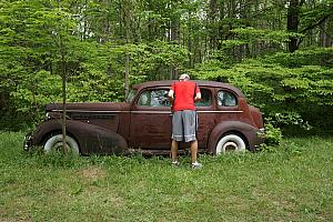 The cabin sat on 300 acres of land -- this old, abandoned buick was sitting in a field on the property