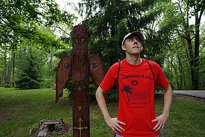 Jay modeling next to some weird statue