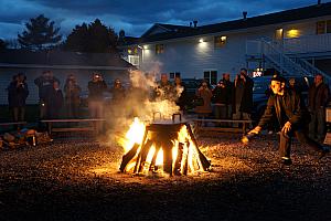 The fish are then placed in another wire basket and lowered in. When the fish oils rise to the top of the pot, the boiler will add a small amount of kerosene to the flames. The increase in flames causes a boilover, the fish oils spill over the side of the pot, and the fish is done.