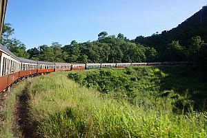 Aboard the train, heading around the bend.