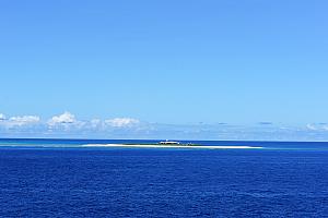 April 2: cruising by Willis Island. That's Willis Island, a lonely isle housing an Australian weather station with four researchers. We "stopped" by here because by some technicality it counted as a non-Australian port, enabling the cruise ship to have the duty free shops open during the trip. 