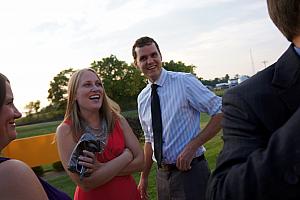 Katie and Adam smiling after the wedding