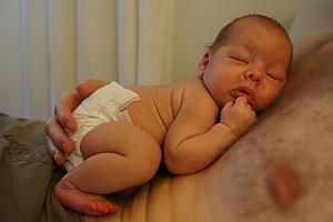 Capri resting on dad's chest. This is a scary photo, sorry :)