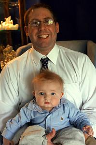 Bennett and his Daddy. Bennett is taking notes for his turn in two weeks.