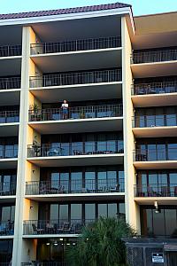 Grandpa watching the sunrise from the balcony