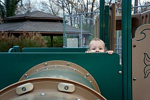 At a playground in Madeira -- Capri peeking above her platform