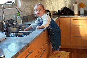 Playing in the sink.