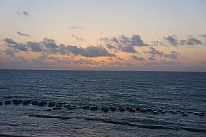 Sunrise looking out on the beach from our balcony.