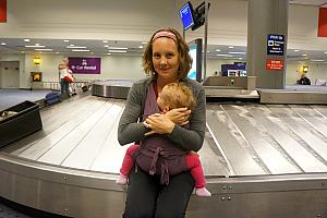 Capri and Kelly back in Cincinnati waiting for our luggage.