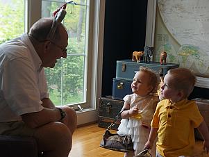 Papa playing with Capri and Benny