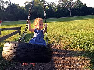 Having fun on the tire swing