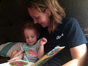 Capri and Mom reading a book