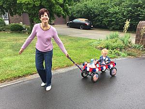 Capri and Mimi ready for the Rolling Knolls parade - check out that fancy wagon!