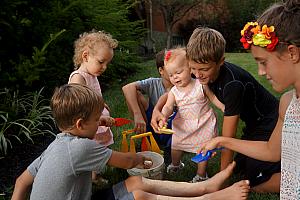 All the kids playing in the sandbox