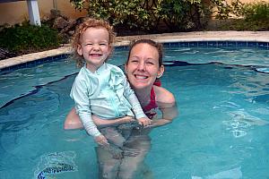 Capri and Kelly in a cooling-off hot tub. Much more fun than the ice cold pools.