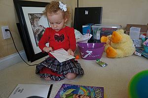 Capri playing with her Easter basket