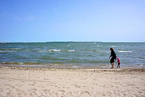 Kenley and Kyleen walking along the beach