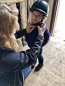 Getting Capri ready for her first ever horseback ride!